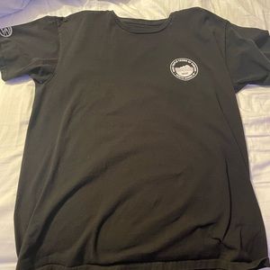 Black colored Vans surfing shirt. Size Large